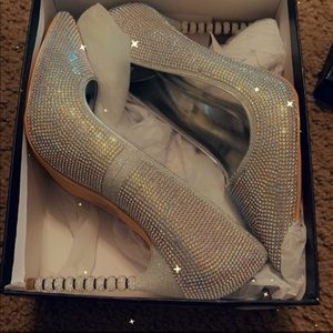 Never worn silver multi rhinestone shoe